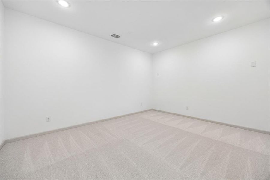 This spacious media room with adjacent game room create the ultimate entertainment zone! This spacious media room with adjacent game room create the ultimate entertainment zone!