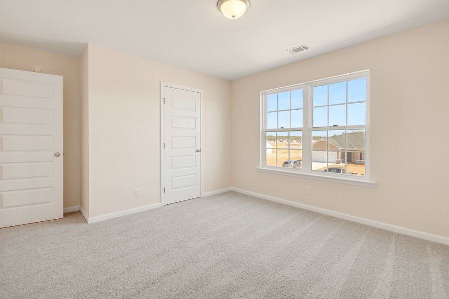 Representative unfurnished interior of a home built from the The Bagley by RTS Homes in Grand Reserve, Hinesville (Image 21).