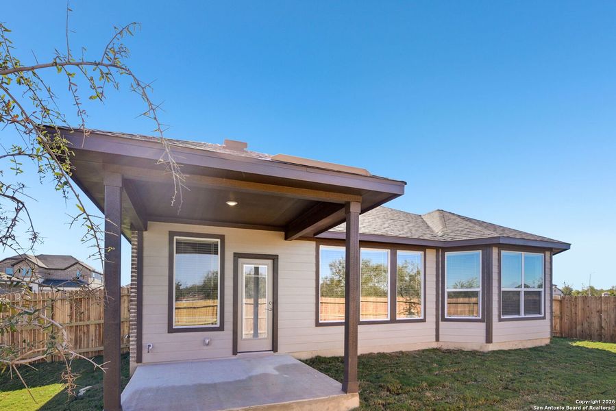 Exterior details and patio area of a home in Carmel Ranch, Schertz (Image 3).