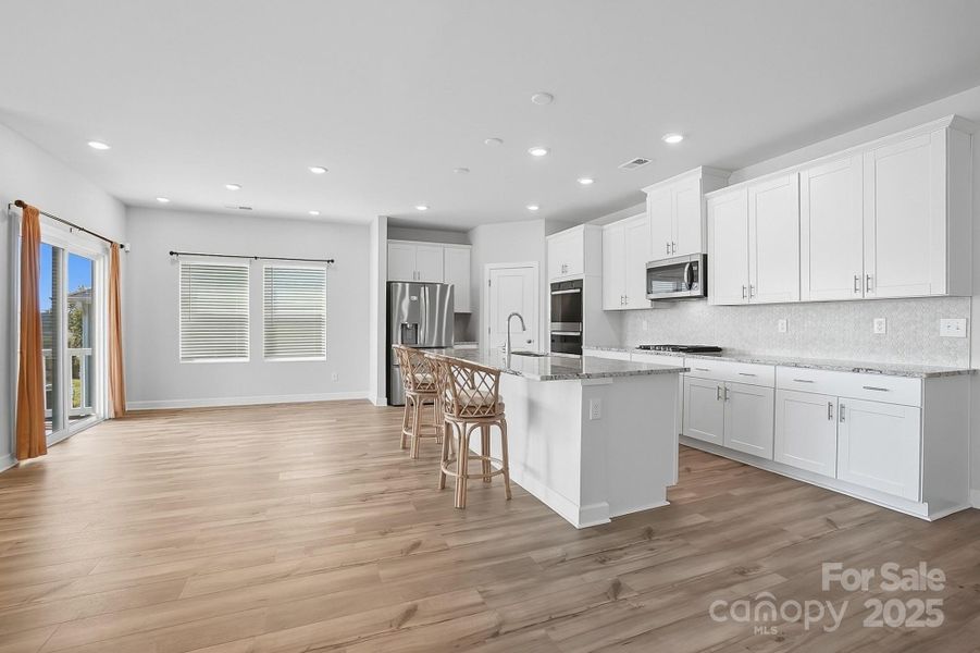Furnished interior view inside a new home in Solena at the Vineyards II, Charlotte (Image 30). Furnished interior view inside a new home in Solena at the Vineyards II, Charlotte (Image 30).