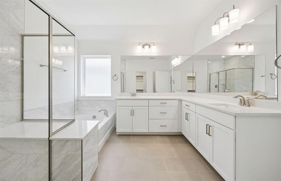 Elegant owner's bathroom with dual vanity and oversized shower *real home pictured Elegant owner's bathroom with dual vanity and oversized shower *real home pictured