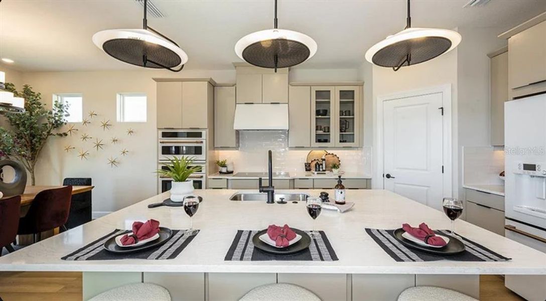 Furnished interior view inside a new home in Esplanade at Wellen Park, Englewood (Image 4).
