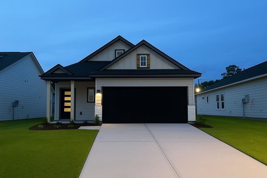 Front exterior of a new home in Hill & Dale Ranch, Splendora, TX, highlighting curb appeal (Image 1). Front exterior of a new home in Hill & Dale Ranch, Splendora, TX, highlighting curb appeal (Image 1).