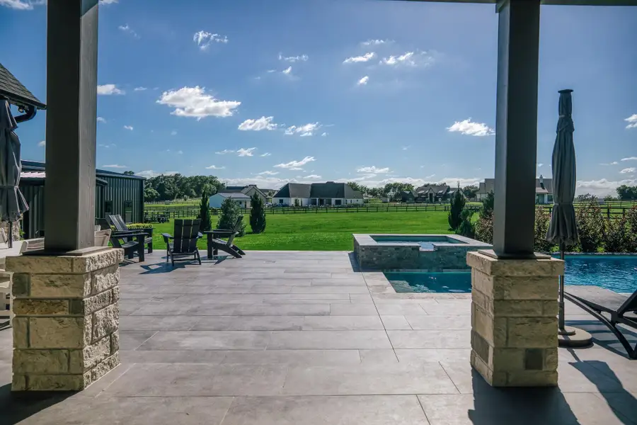 Exterior details and patio area of a home in , Chappell Hill (Image 3).