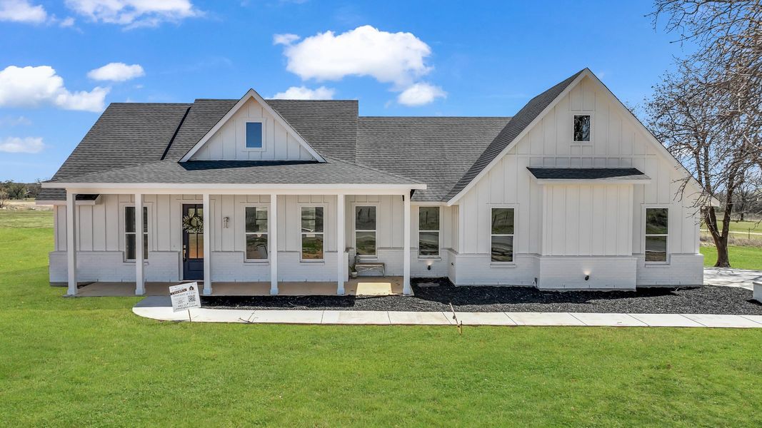 Representative exterior photo of a completed home built from the Clementine by Zeal Home Builders in Saddle Crest Estates, Weatherford, TX (Image 24).