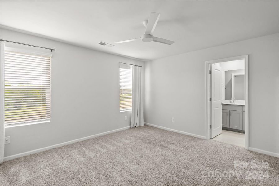 Primary bedroom with en-suite bath