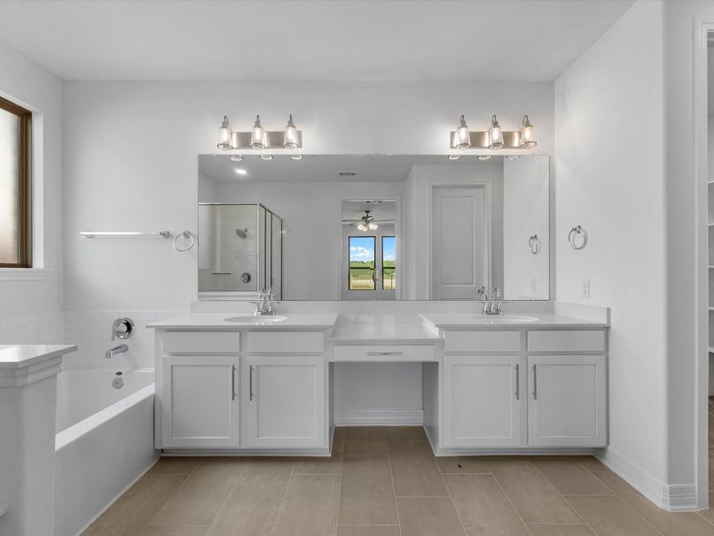 Primary bathroom. Sample product photo. Actual exterior and interior selections may vary by homesite. Photo may be virtually staged. Primary bathroom. Sample product photo. Actual exterior and interior selections may vary by homesite. Photo may be virtually staged.
