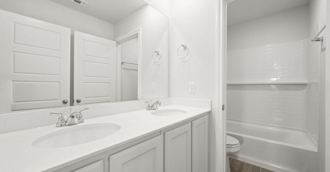 Representative exterior photo of a completed home built from the Oliver by Impression Homes in Redden Farms, Midlothian, TX (Image 19). Representative exterior photo of a completed home built from the Oliver by Impression Homes in Redden Farms, Midlothian, TX (Image 19).