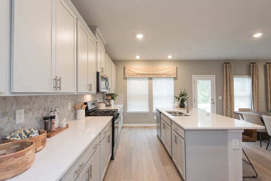 Furnished interior view inside a new home in Harmony Manor, Fairburn (Image 8).