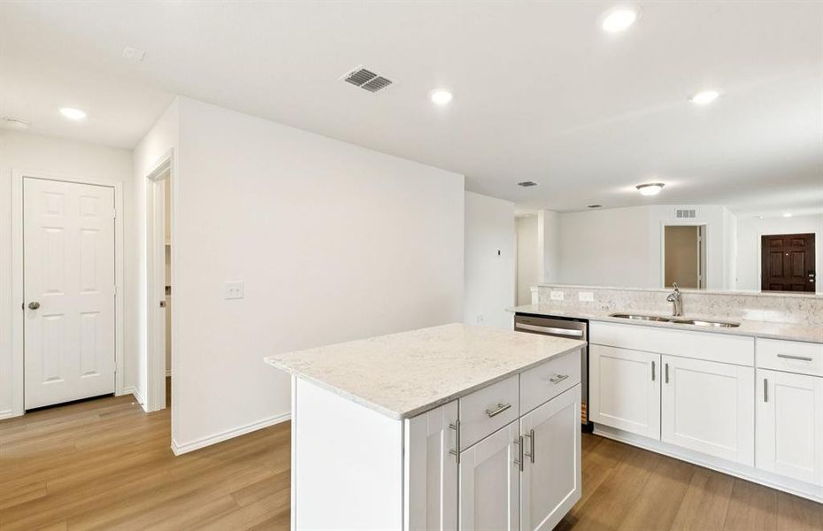 Airy kitchen with ample cabinet space