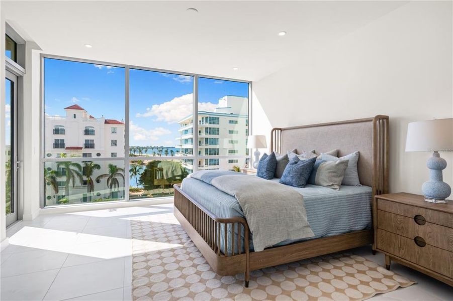 Primary bedroom with amazing views of Sarasota Bay.