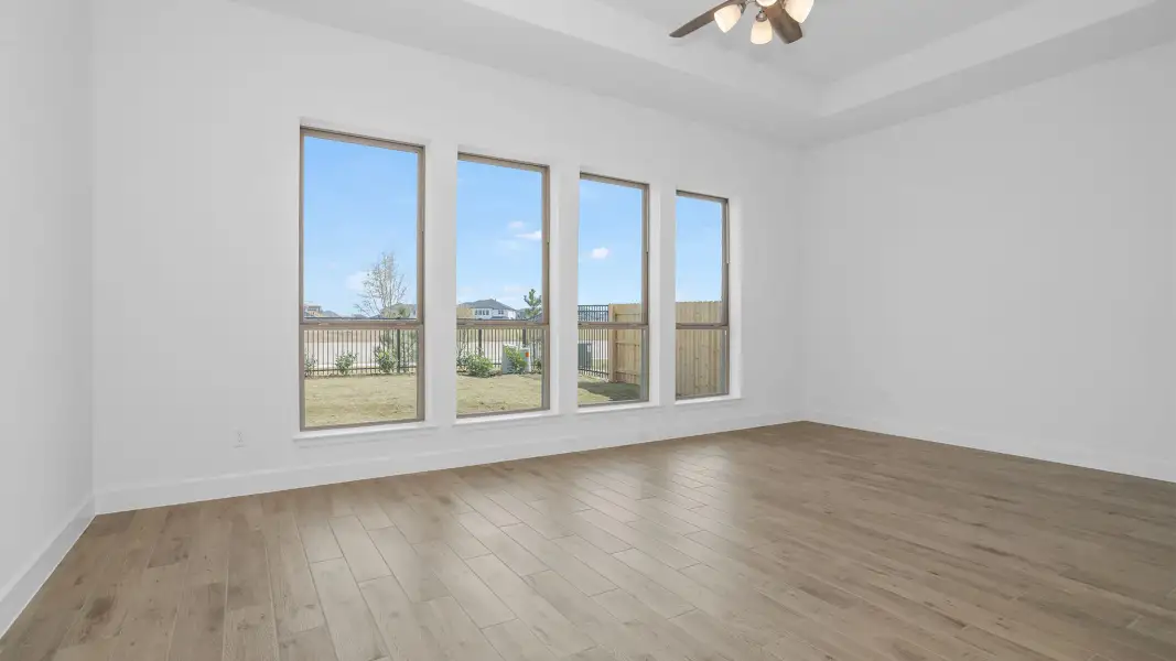 Spacious, unfurnished interior of a new home in Legacy Prairie at Katy Court, Katy (Image 6).