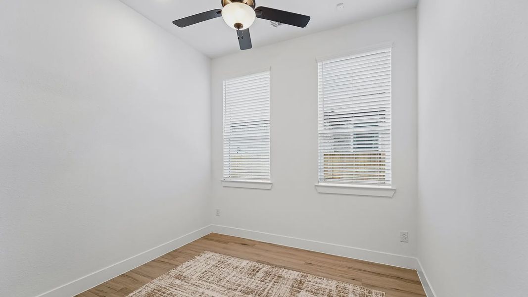 Representative unfurnished interior of a home built from the Cayman by Chesmar Homes in Crescent Bluff, Georgetown (Image 27).