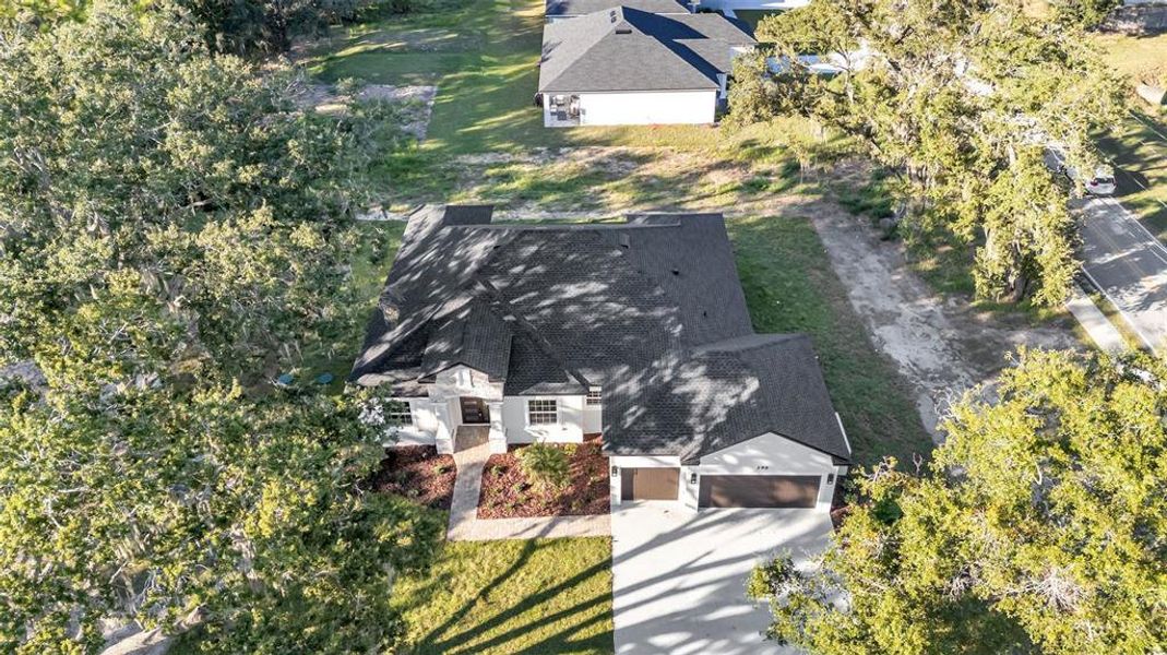 Front exterior of a new home in , Lakeland, FL, highlighting curb appeal (Image 28).