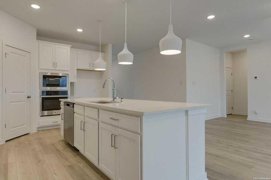 Furnished interior view inside a new home in Nopal Valley, San Antonio (Image 9).
