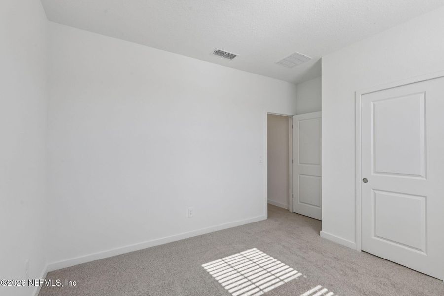 Spacious, unfurnished interior of a new home in Cypress Meadows - Signature Series, Jacksonville (Image 29).
