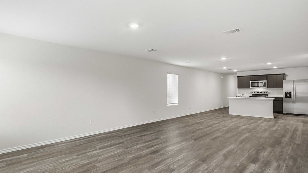 Representative unfurnished interior of a home built from the Emma by D.R. Horton in Maplewood Meadows, Forney (Image 14).