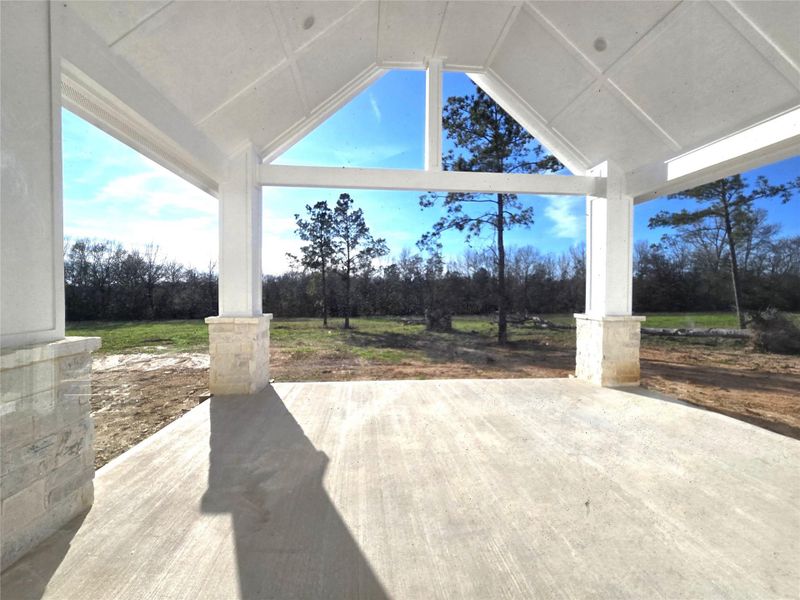 Patio and views of back yard from patio outside breakfast room