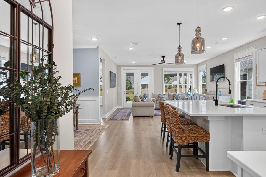 Furnished interior view inside a new home in K. Hovnanian's® Four Seasons at Lakes of Cane Bay, Summerville (Image 11).