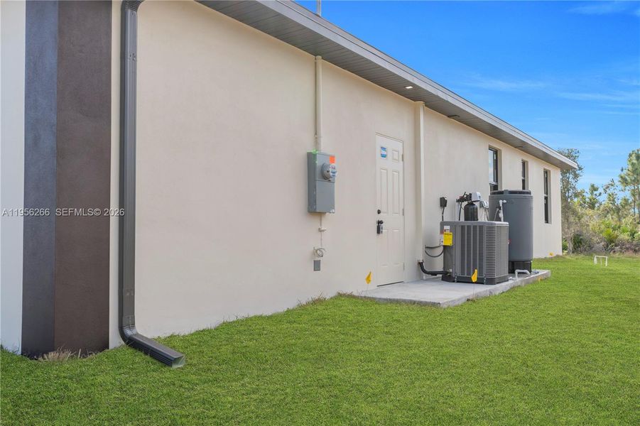 Exterior details and patio area of a home in , Lehigh Acres (Image 3).