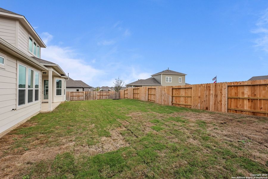 Exterior details and patio area of a home in Homestead 75', Schertz (Image 3).