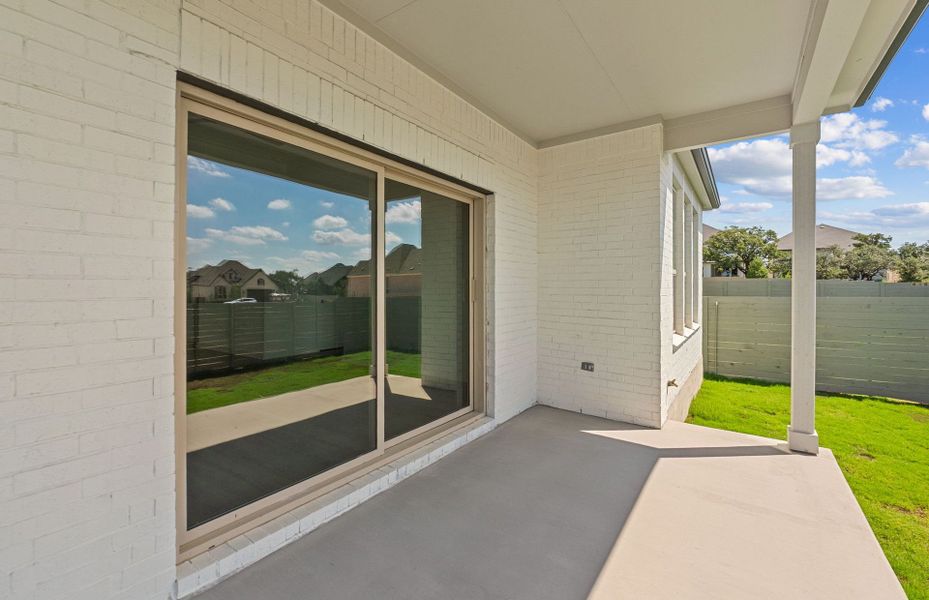 Exterior details and patio area of a home in Wolf Ranch, Georgetown (Image 4).
