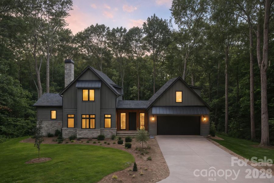 Incredible Exterior Finishes Including Custom Stonework and Vertical Ipe Wood Accent