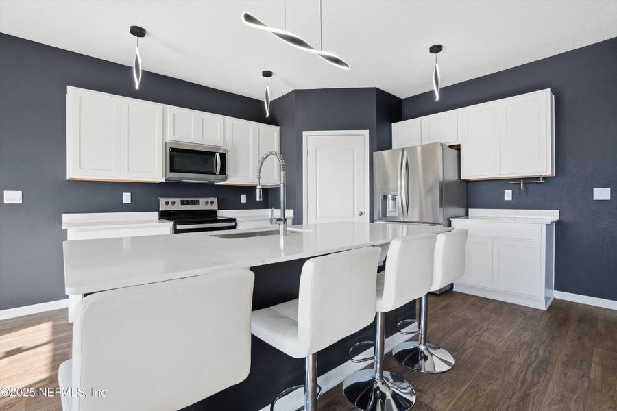 Furnished interior view inside a new home in Sawmill Branch Express, Palm Coast (Image 8). Furnished interior view inside a new home in Sawmill Branch Express, Palm Coast (Image 8).