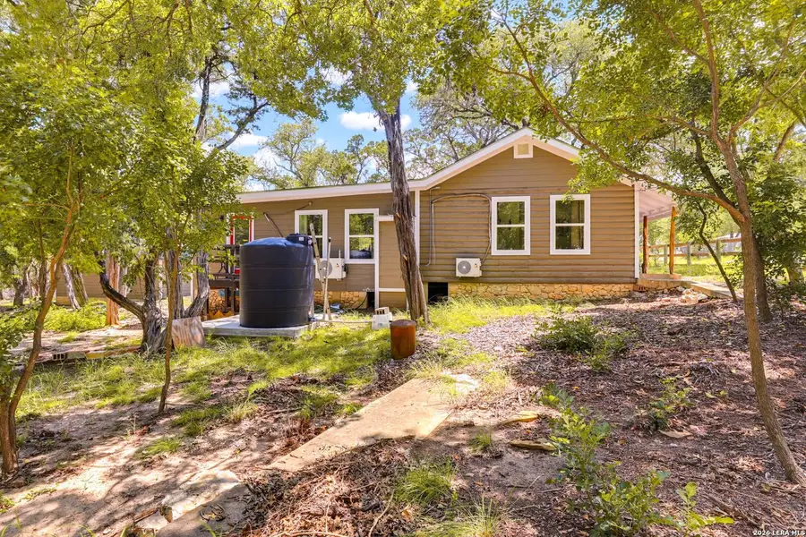 Exterior details and patio area of a home in , Lakehills (Image 18).