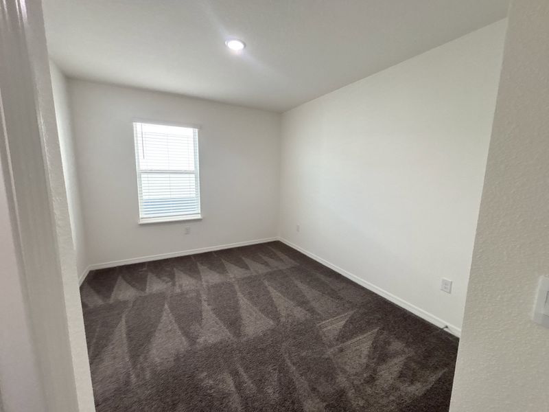Spacious, unfurnished interior of a new home in Lake Deer Estates, Poinciana (Image 17).
