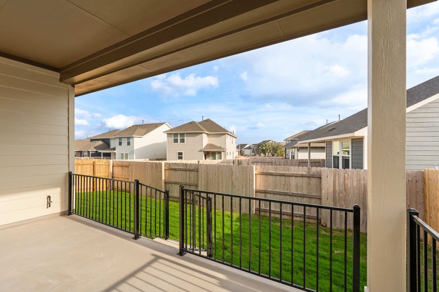 Exterior details and patio area of a home in Lariat, Liberty Hill (Image 24).