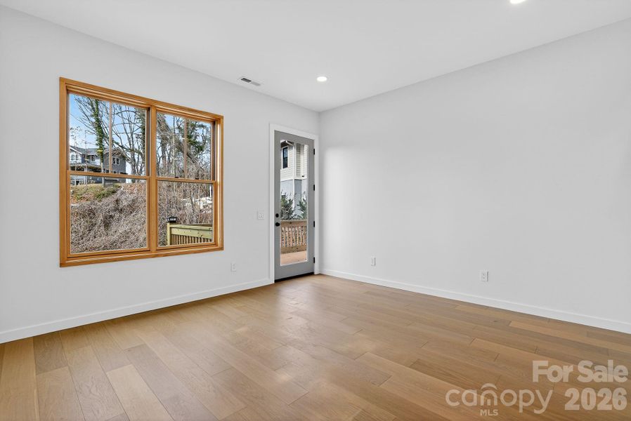 Spacious, unfurnished interior of a new home in , Asheville (Image 21).