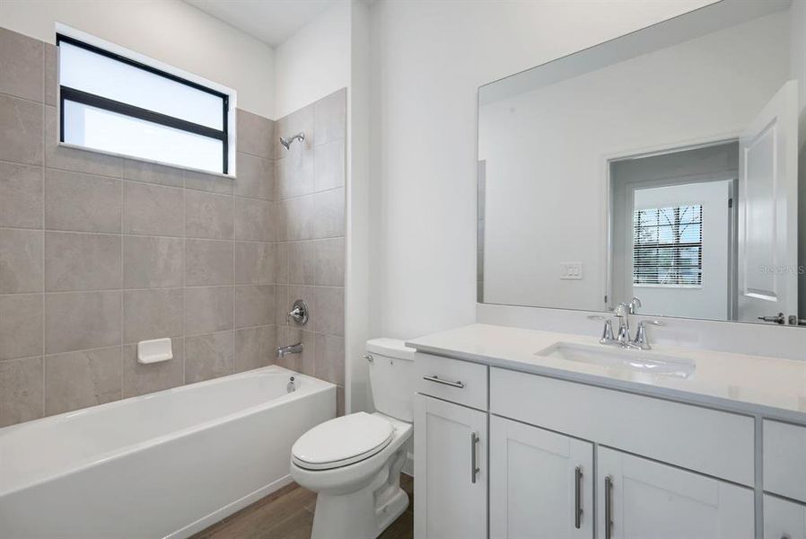 Furnished interior view inside a new home in Verdana Village, Estero (Image 9).
