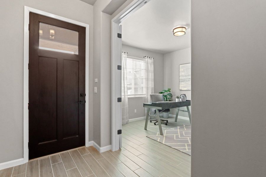 Representative furnished interior of a home built from the Pershing by Hakes Brothers in Paseo Del Este, El Paso (Image 31).