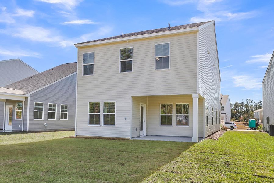 Exterior details and patio area of a home in Wildcat Chase, Summerville (Image 4).