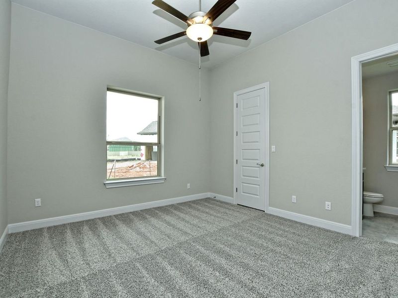 Representative unfurnished interior of a home built from the Madera II by Giddens Homes in Scofield Farms Estates, Georgetown (Image 386).