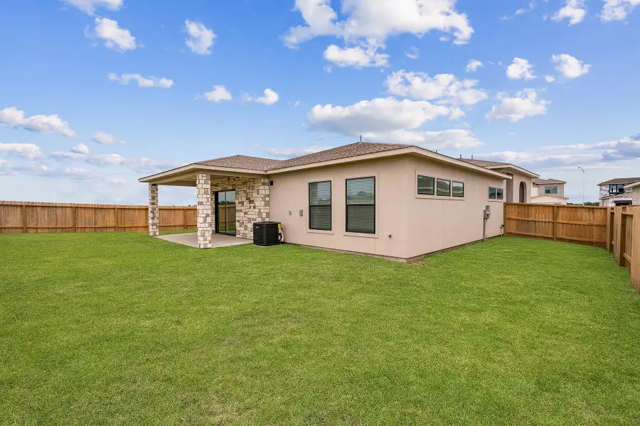 Exterior details and patio area of a home in Hallimore Ranch, Rosenberg (Image 1).