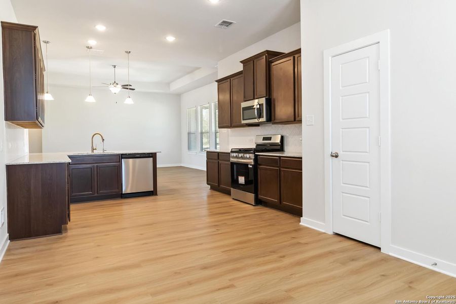 Furnished interior view inside a new home in Jordan's Ranch, San Antonio (Image 7).