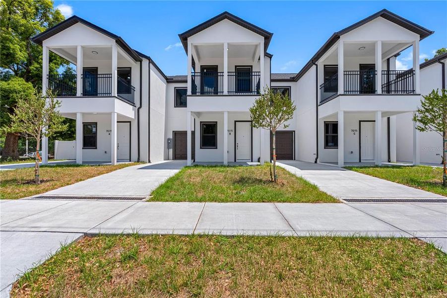Front exterior of a new home in , Tampa, FL, highlighting curb appeal (Image 5).