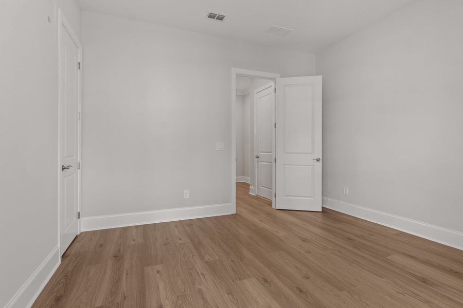 Representative unfurnished interior of a home built from the The Danville by The Providence Group in Bellwyn, Alpharetta (Image 48).