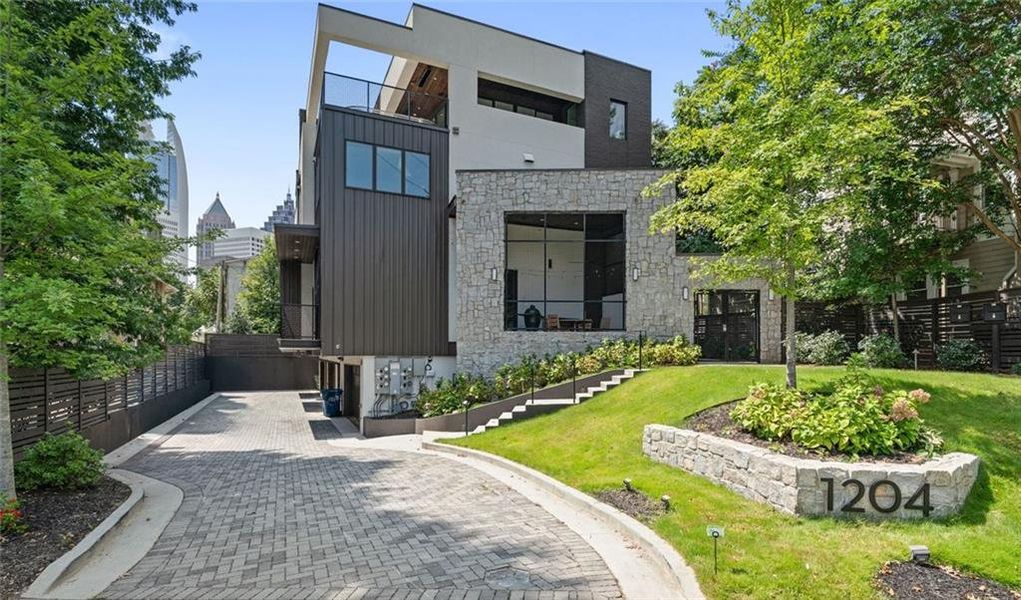 Front exterior of a new home in , Atlanta, GA, highlighting curb appeal (Image 20).