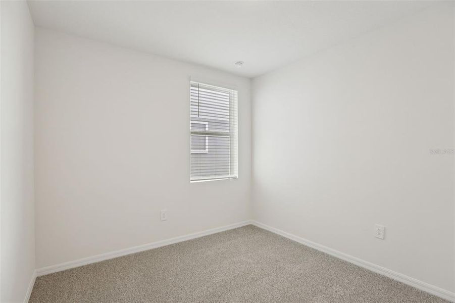 Spacious, unfurnished interior of a new home in Springs at Lake Alfred - Classic Series, Lake Alfred (Image 35).