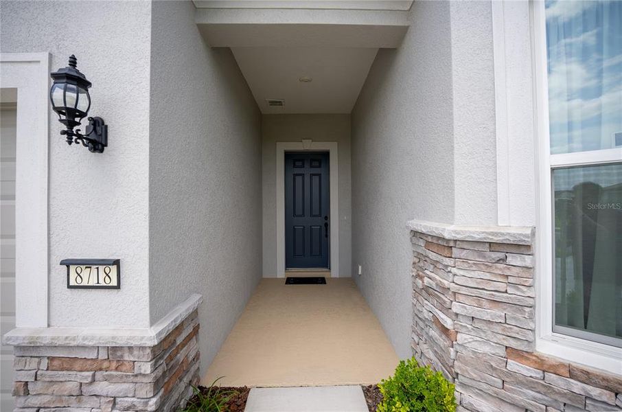Exterior details and patio area of a home in Del Webb Stone Creek, Ocala (Image 3).