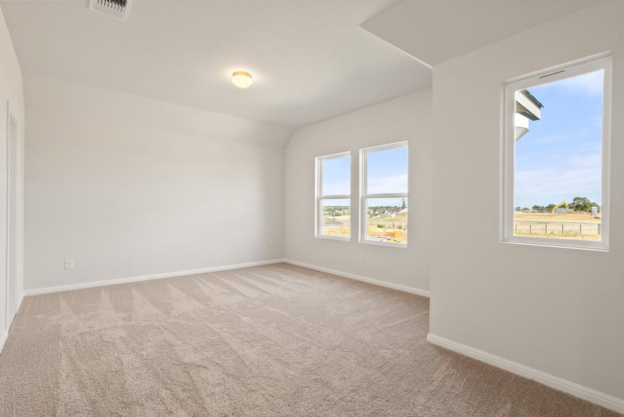 Representative unfurnished interior of a home built from the Somerville by Ashton Woods in Willow Springs, Buda (Image 36).