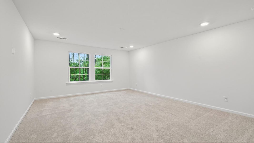 Spacious, unfurnished interior of a new home in Creekside at Andrews, Summerville (Image 18).