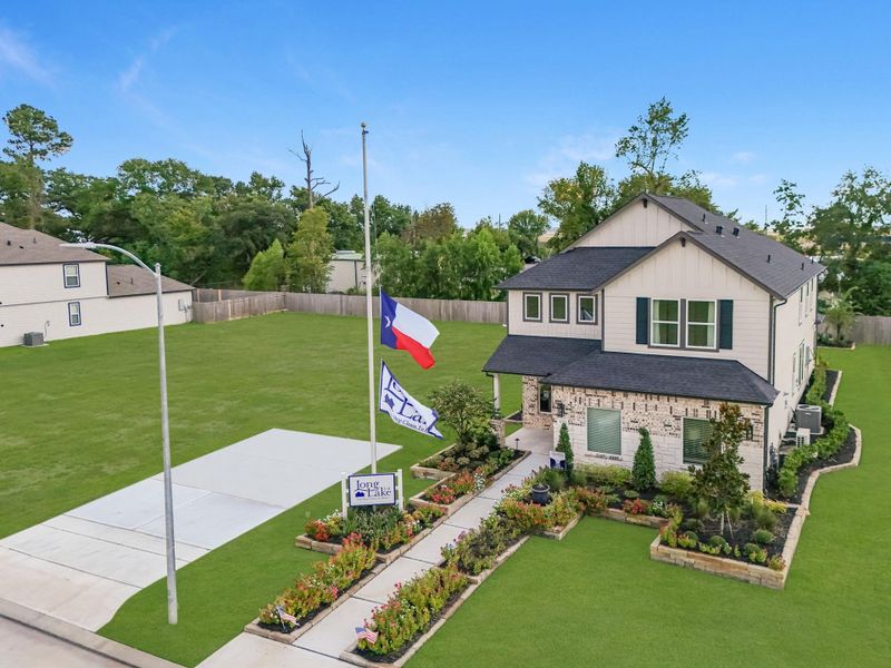 Front exterior of a new home in Cypresswood Landing, Humble, TX, highlighting curb appeal (Image 16).