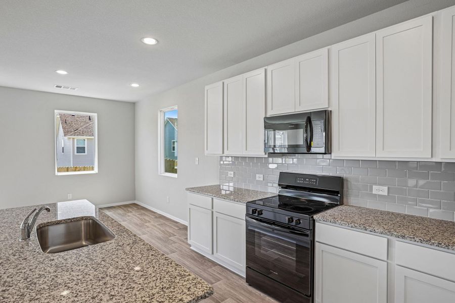 Furnished interior view inside a new home in Edgebrooke, Pflugerville (Image 7).