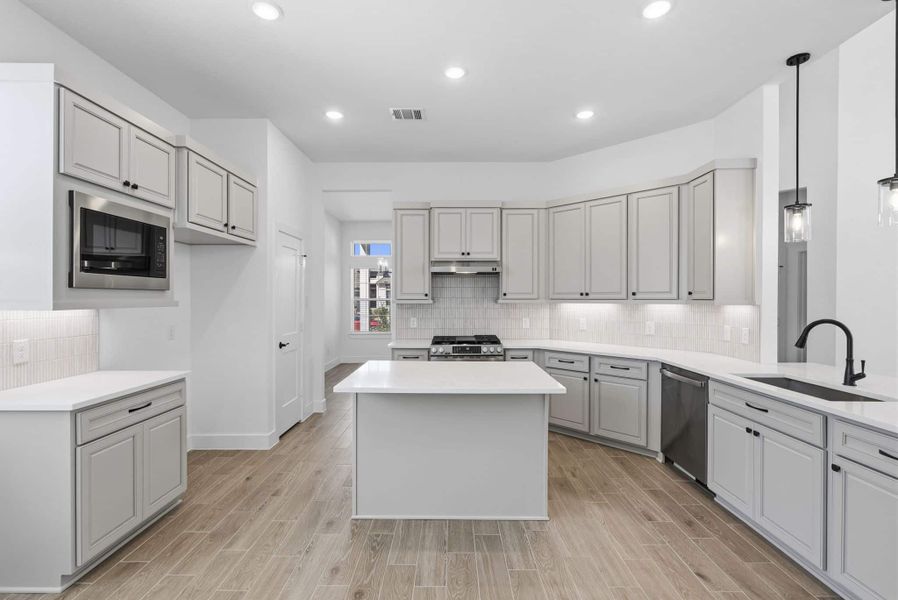 Furnished interior view inside a new home in Bridgeland, Cypress (Image 5). Furnished interior view inside a new home in Bridgeland, Cypress (Image 5).