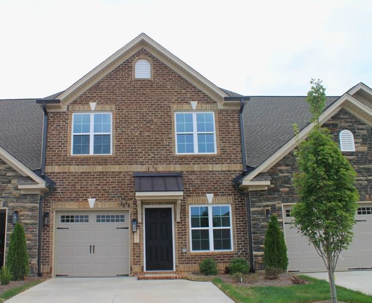 Front exterior of a new home in Weybridge, Burlington, NC, highlighting curb appeal (Image 2). Front exterior of a new home in Weybridge, Burlington, NC, highlighting curb appeal (Image 2).