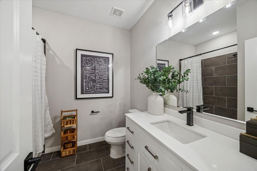 *Photos are of model home located in the community to reference finishes*